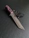 "Tanto" is a universal tactical knife with a modern design (etching, black-pink handle, black scabbard)