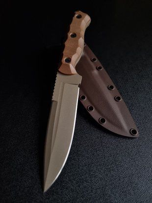 "Shchedryk: Your Protected Journey" (tan polymer, orange handle, colored scabbard)