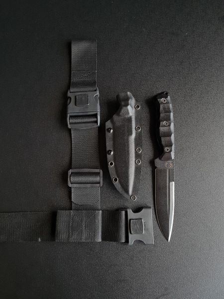 Shchedrik polymer black - a widely versatile knife with an double-edged blade (Black handle, black scabbard)