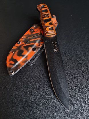 Khorunzhiy &ndash; a tourist knife for those who lead nature travels (black polymer, black-orange handle, colored scabbard)
