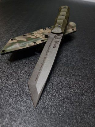 Tanto &ndash; a tourist knife for those who conquer the elements of nature (etching, olive handle, camouflage sheath)