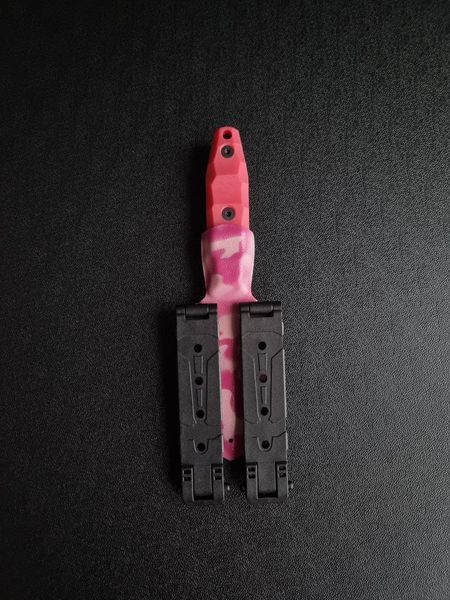 "Sirko: Hunting Knife for Real Pros" (etching, pink handle, colored scabbard)