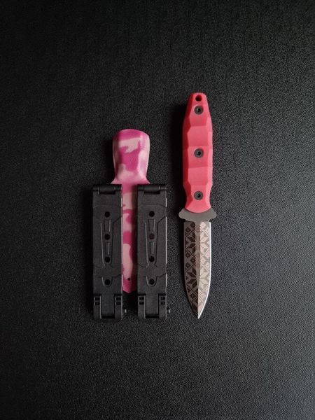 "Sirko: Hunting Knife for Real Pros" (etching, pink handle, colored scabbard)
