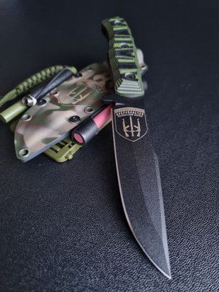 "Aeneas" - buy a tourist knife for conquering wild spaces (black polymer, black-green handle, camouflage sheath)
