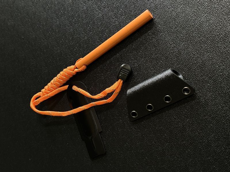 Fire starter (orange) with scraper