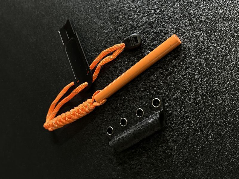 Fire starter (orange) with scraper