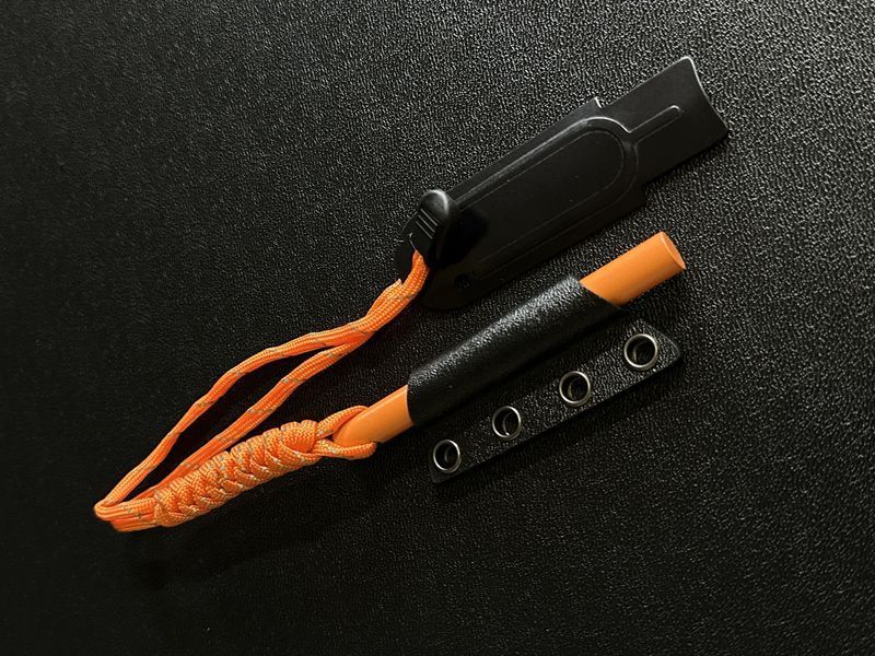 Fire starter (orange) with scraper