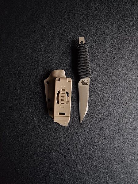 "Paton" is a light and strong skeleton knife (tan polymer, colored scabbard)