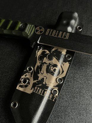 "Tanto" &ndash; Unyielding power for a true hunter (black polymer, black-green handle, black scabbard)