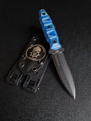 "Sirko: A Hiking Knife for True Leaders" (black polymer, blue handle, black scabbard)