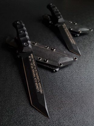 "Tanto: Accuracy and Power for the Hunter" (black polymer, black handle, black scabbard)