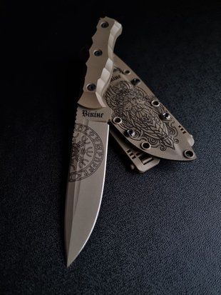 "Shchedryk: Tourist Knife for Brave Tourists" (tan polymer, tan handle, colored scabbard)