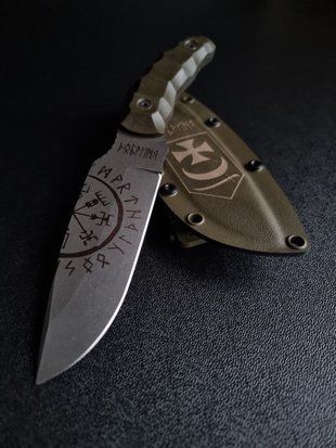 "Tiger Hunter: A Reliable Companion for Long Journeys" (etching, olive handle, colored scabbard)