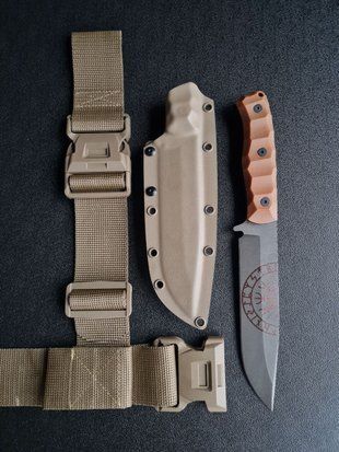 "Haidamak: Hiking Knife for Those Who Walk the Path of the Brave" (etching, orange handle, tan scabbard)