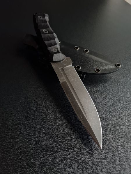 «Schedryk» - a widely versatile knife with an double-edged blade, black handle, black scabbard