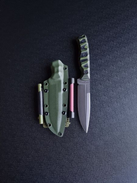 "Schedryk" is a tactical knife with maximum efficiency (etching, black-green handle, colored scabbard)