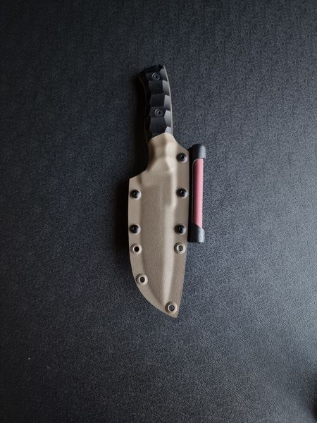 Shchedrik polymer tan - a widely versatile tactical knife with a double-edged blade (Black handle, colored scabbard)