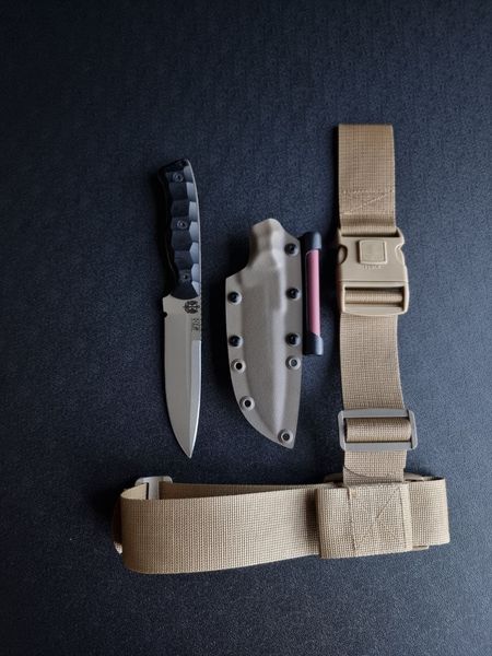 Shchedrik polymer tan - a widely versatile knife with a double-edged blade (Black handle, black scabbard)