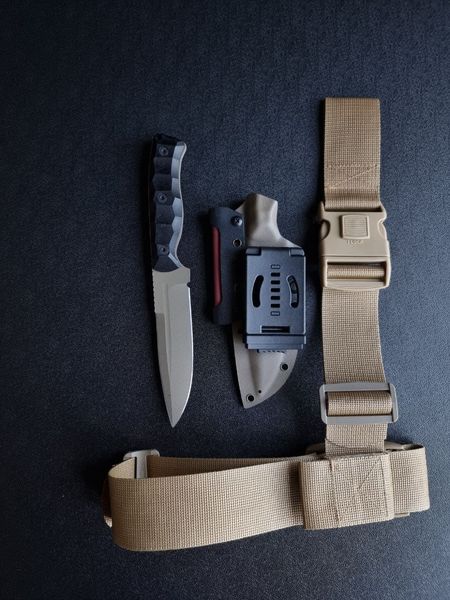 Shchedrik polymer tan - a widely versatile tactical knife with a double-edged blade (Black handle, colored scabbard)